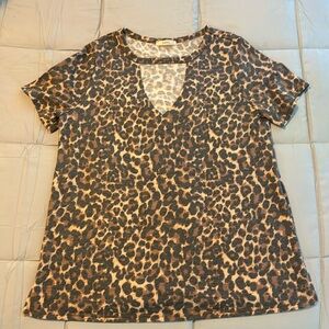 A gorgeous Jodifl leopard print shirt. This shirt has a v-shaped neck cut out!